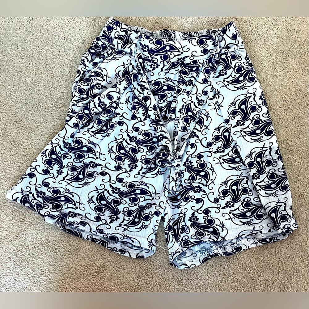 Blue and white shorts with a tie